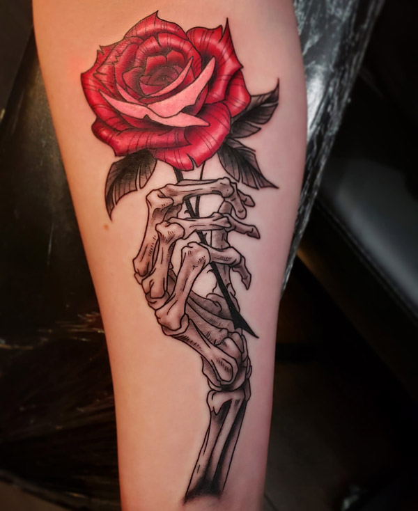 sam-fernandez-tattoo-skeleton-hand-rose